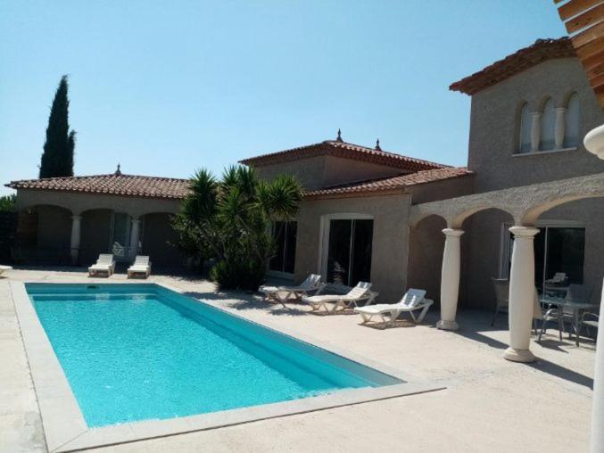 Bienvenue A L Hacienda Villa Magalas Bagian luar foto