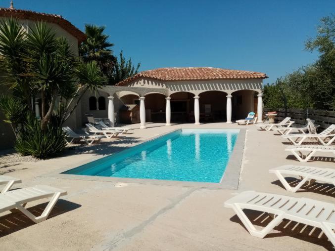 Bienvenue A L Hacienda Villa Magalas Bagian luar foto